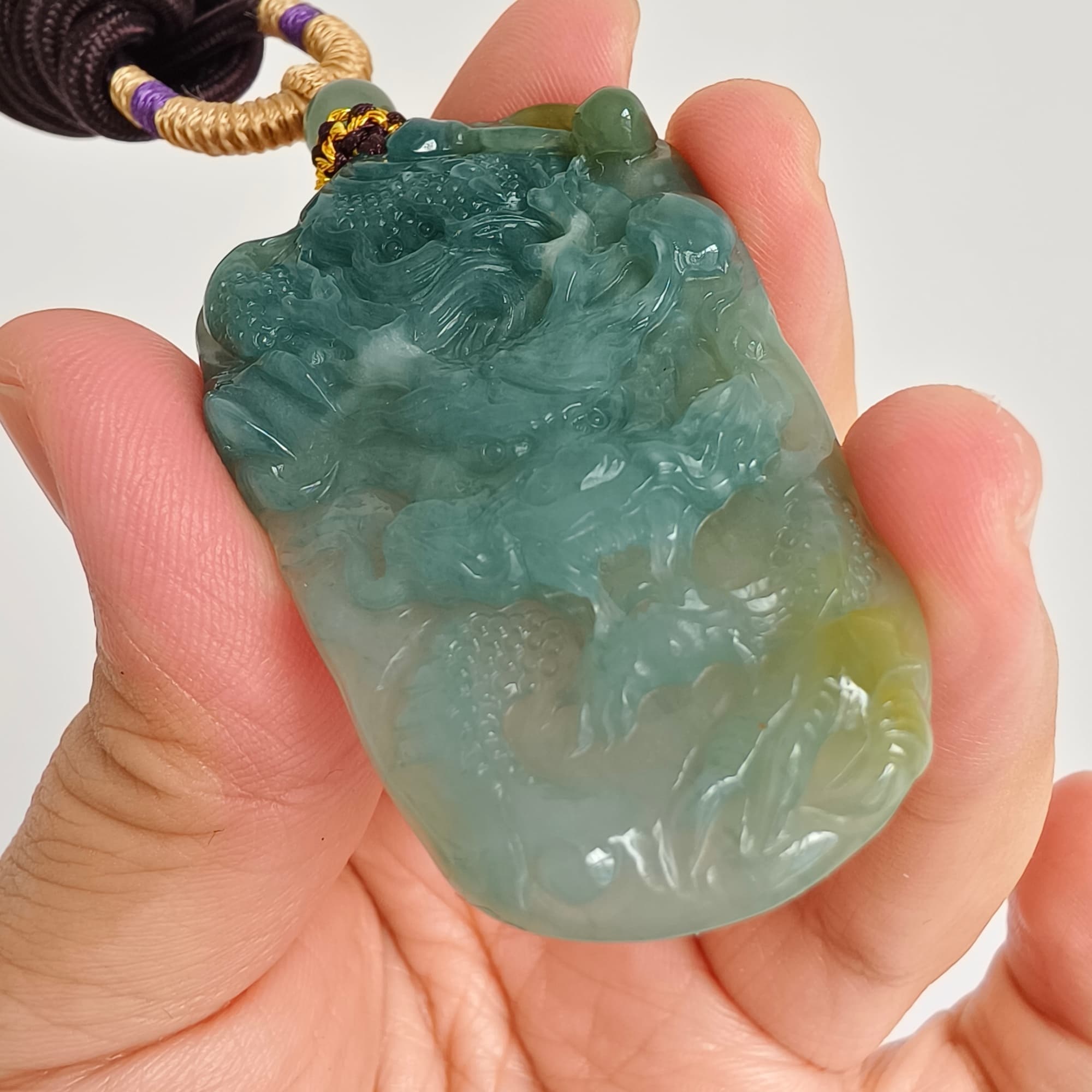 DDP 55.5mm Natural Type A Icy Blue Yellow Guatemalan Jadeite Dragon Pendant