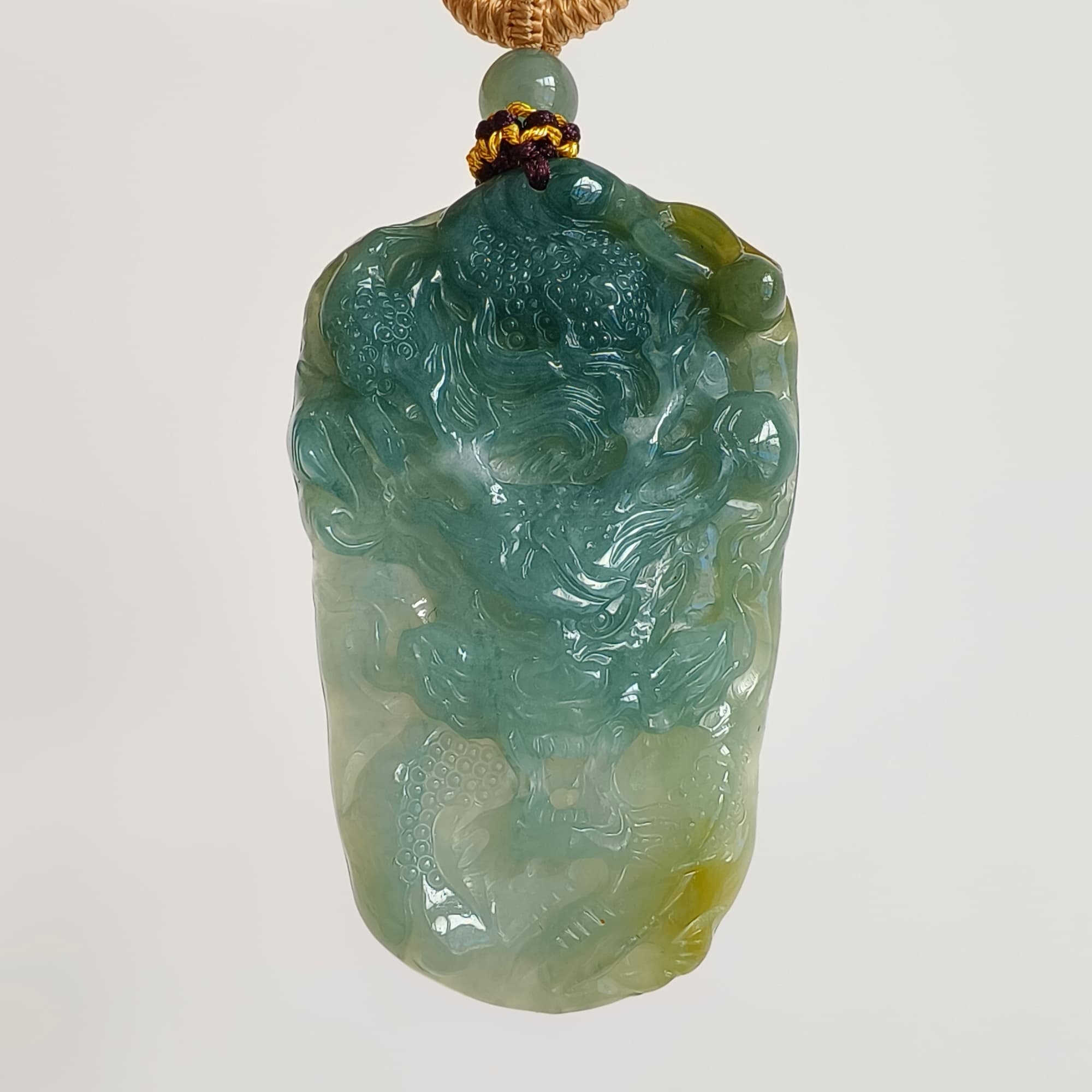 DDP 55.5mm Natural Type A Icy Blue Yellow Guatemalan Jadeite Dragon Pendant