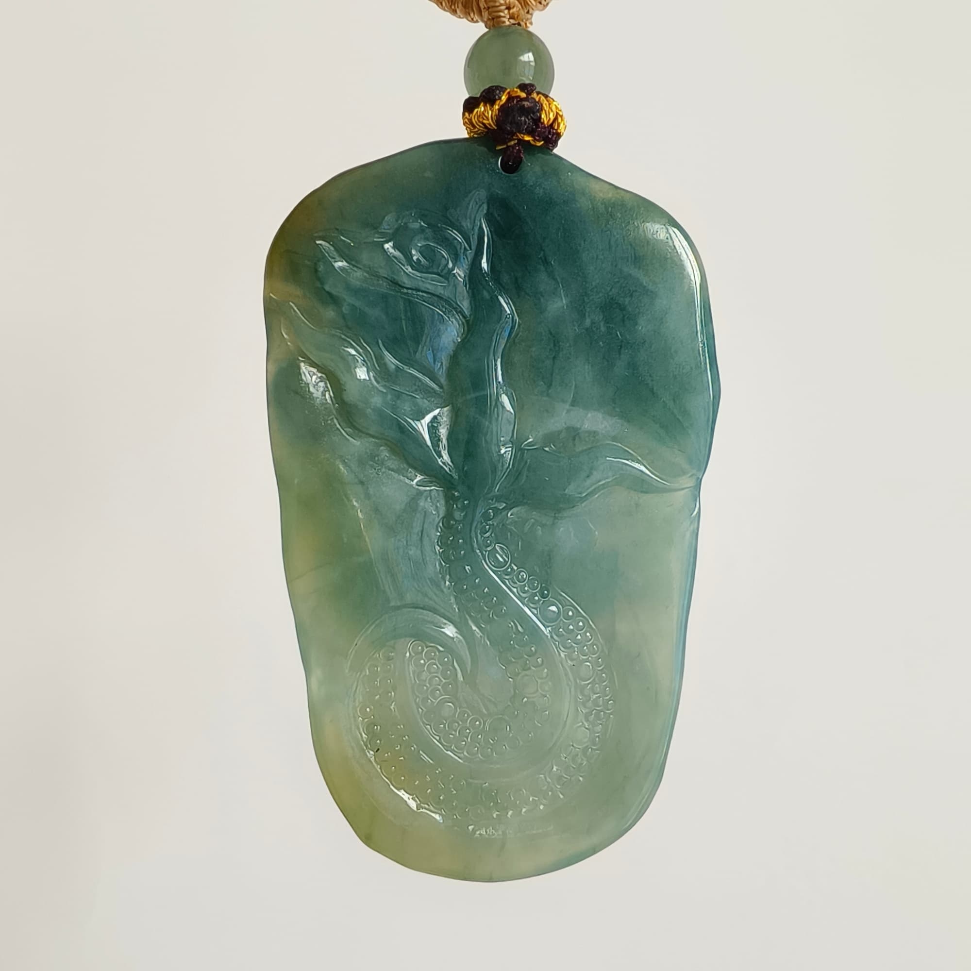 DDP 55.5mm Natural Type A Icy Blue Yellow Guatemalan Jadeite Dragon Pendant
