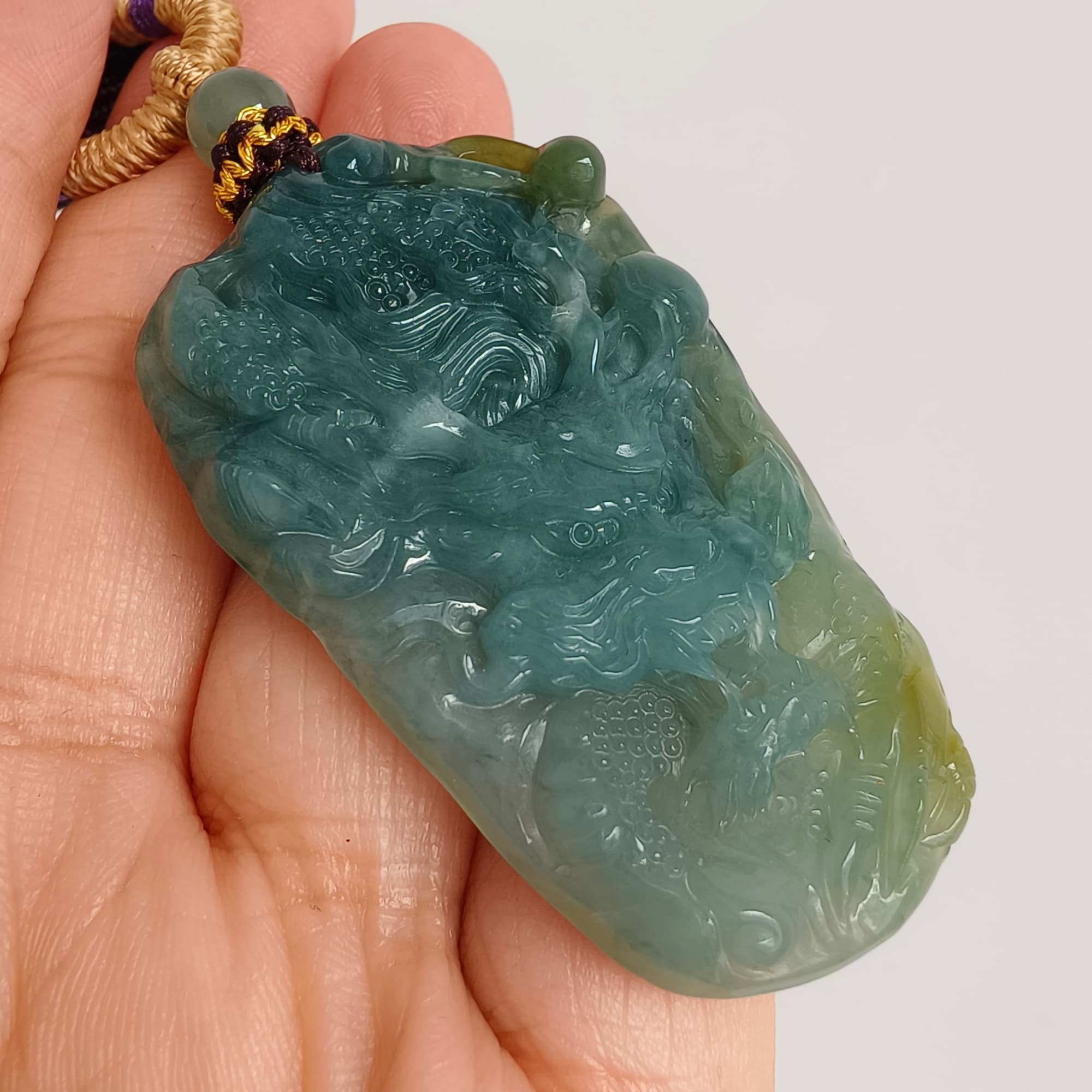 DDP 55.5mm Natural Type A Icy Blue Yellow Guatemalan Jadeite Dragon Pendant