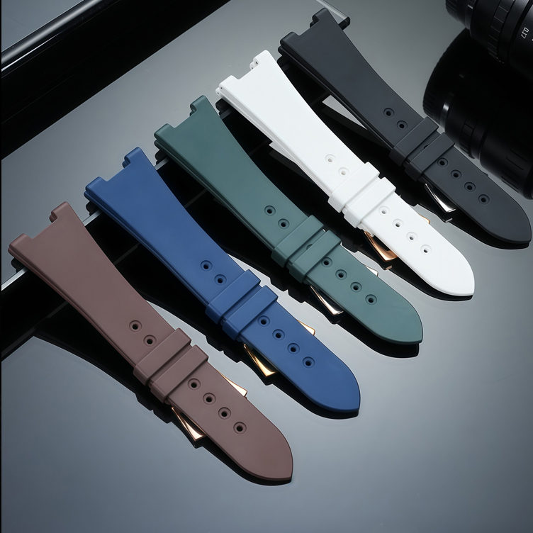 Underside of five silicone straps showing buckles and sizing holes