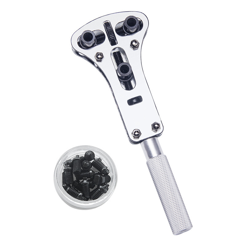Silver three-prong case back opener with interchangeable bits