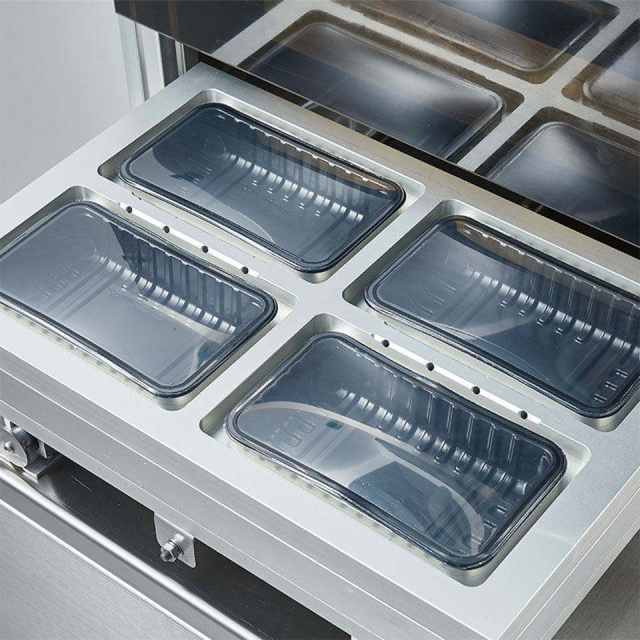 Máquina de embalagem MAP vertical DQ440L-E com seladora a gás para filmes de 440 mm.