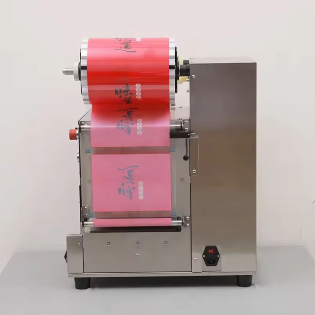 DF250TA Seladora automática de bandejas para recipientes de alimentos, copos, tampas e kits de refeição.