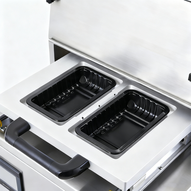 Máquina de embalagem a vácuo de mesa DQ400T-VS com largura máxima de filme de 390 mm.