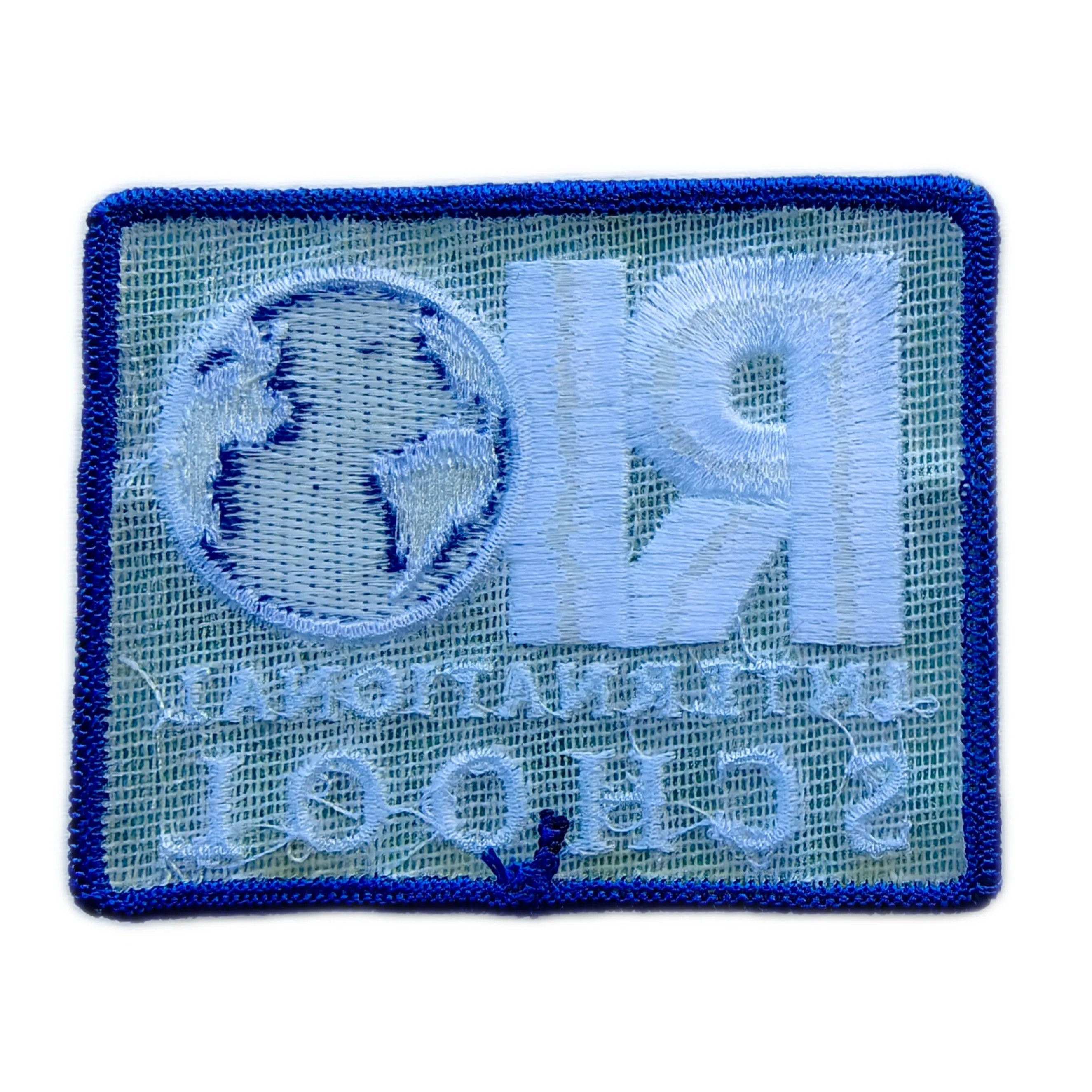 Official Rio International School (RIS) Logo Embroidered Patch (3.15" W x 2.68" T)-Back Side