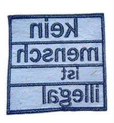 "Kein Mensch ist illegal" Anti-Racism Human Rights Patch-Back Side