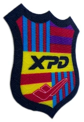XPD Shield-Shape Custom Woven Patch (1.55”W x 2”H, Cut Edge)-Left Side