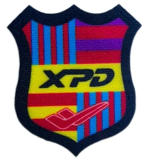 XPD Shield-Shape Custom Woven Patch (1.55”W x 2”H, Cut Edge)-Front Side
