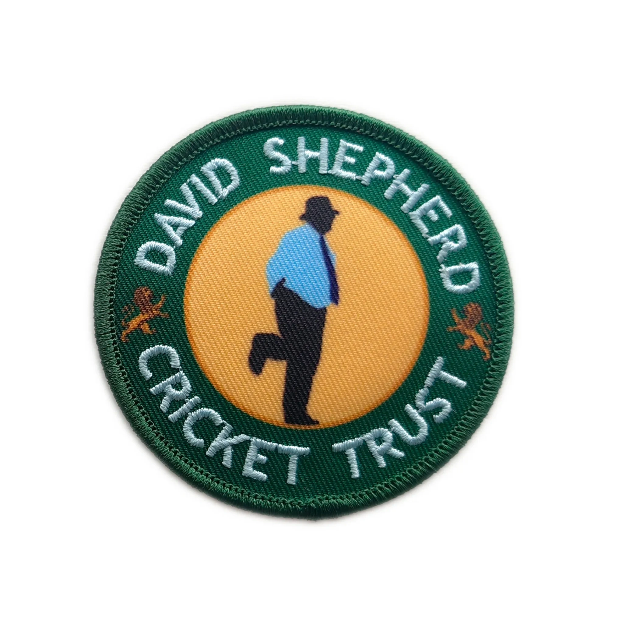 David Shepherd Cricket Trust Commemorative Round Patch – Green & Gold Design-Front Side