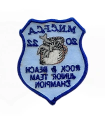 MNCFCA 2022 Rock & Beach Junior Team Champion Embroidered Patch – Blue Shield Design-Back Side