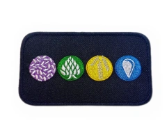 Four Elements Themed Embroidered Iron-On Patch with Black Merrow Border (4.5"W x 2.55"H)-Front Side