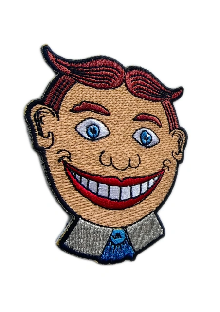 Funny Cartoon Face Embroidered Patch – Smiling Character with Blue Tie-Left Side