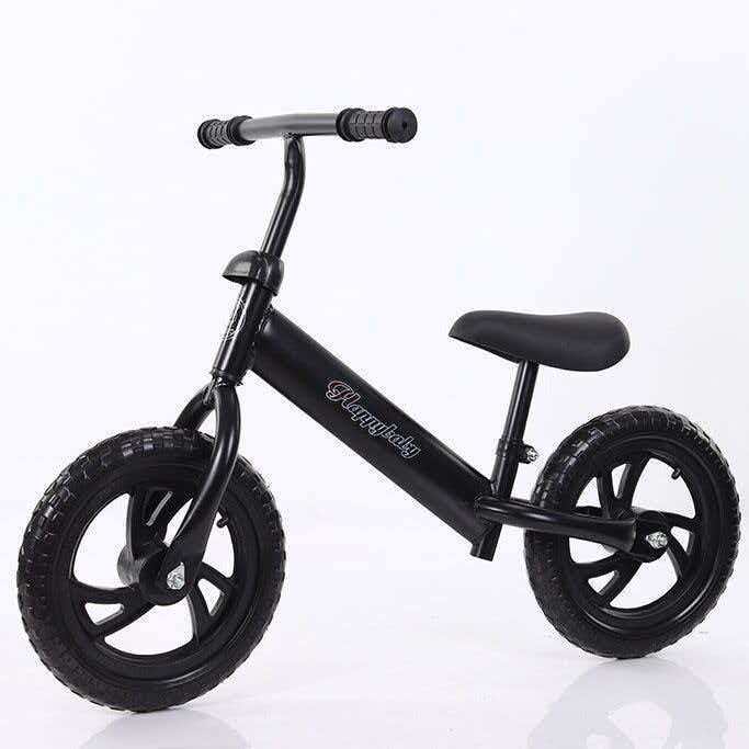 Toddler Balance Bike - No-Pedal Glider for 2-6 Year Olds, featuring Adjustable Seat, Sturdy Frame & Colorful/Solid Tire Options.