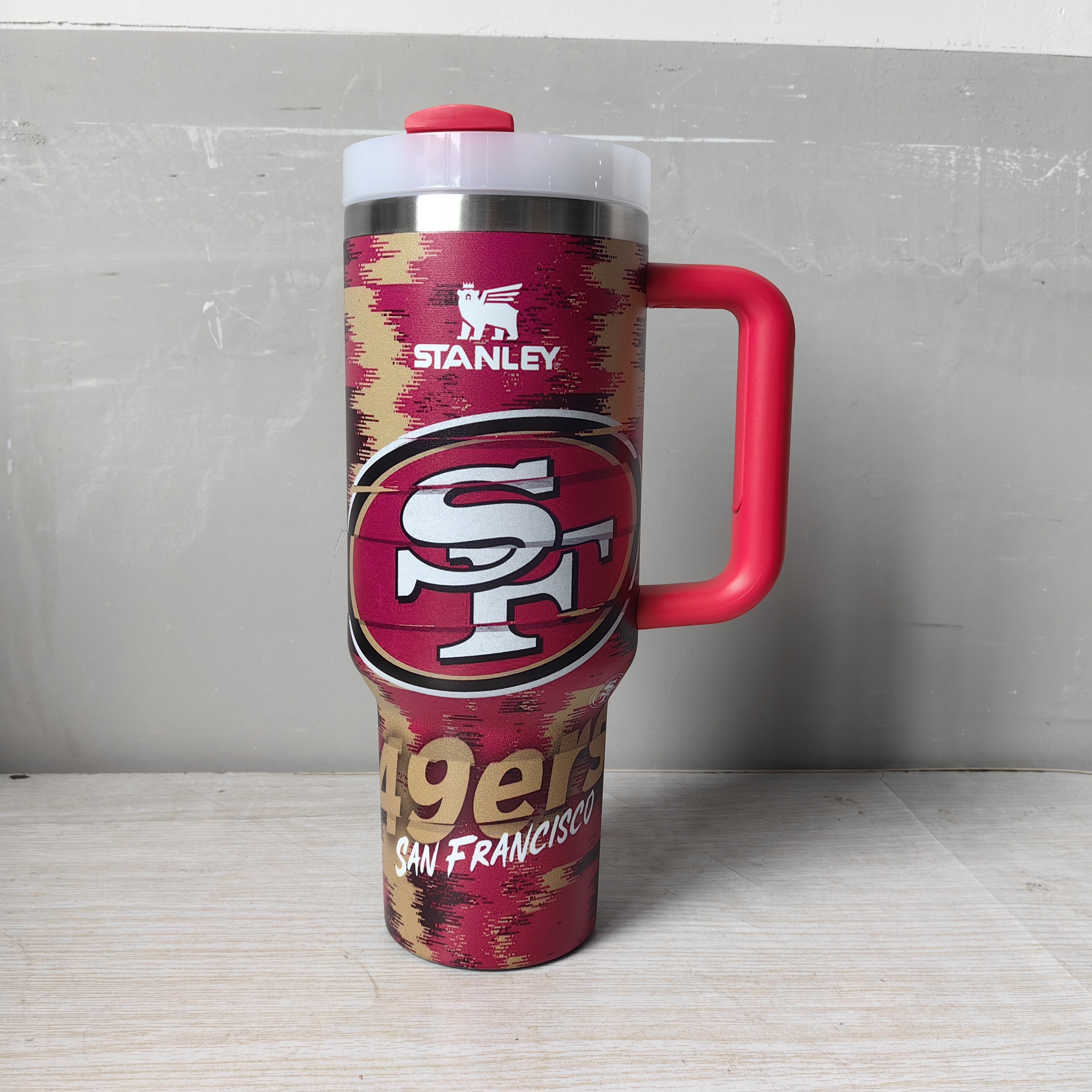 STANLEY NFL Team Logo Quencher H2.0 Tumbler with Handle and Straw 40 oz Holder Compatible for Travel Insulated Stainless Steel Cup BPA-Free