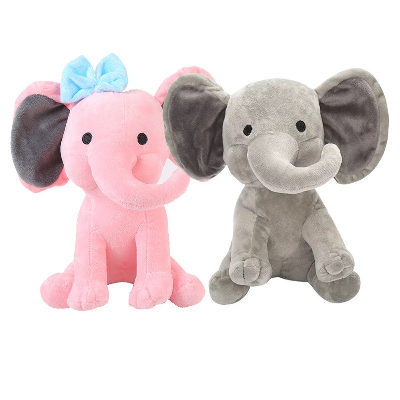 Plush elephant toy, a comforting companion for sleeping, with a long trunk; a cute plush elephant doll/stuffed animal.