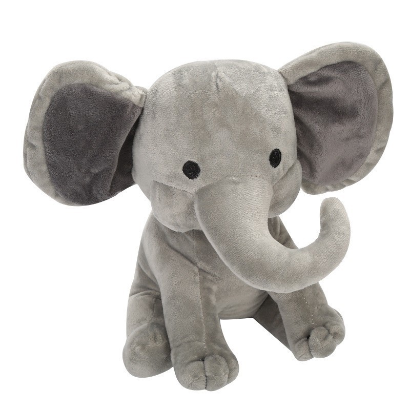 Plush elephant toy, a comforting companion for sleeping, with a long trunk; a cute plush elephant doll/stuffed animal.