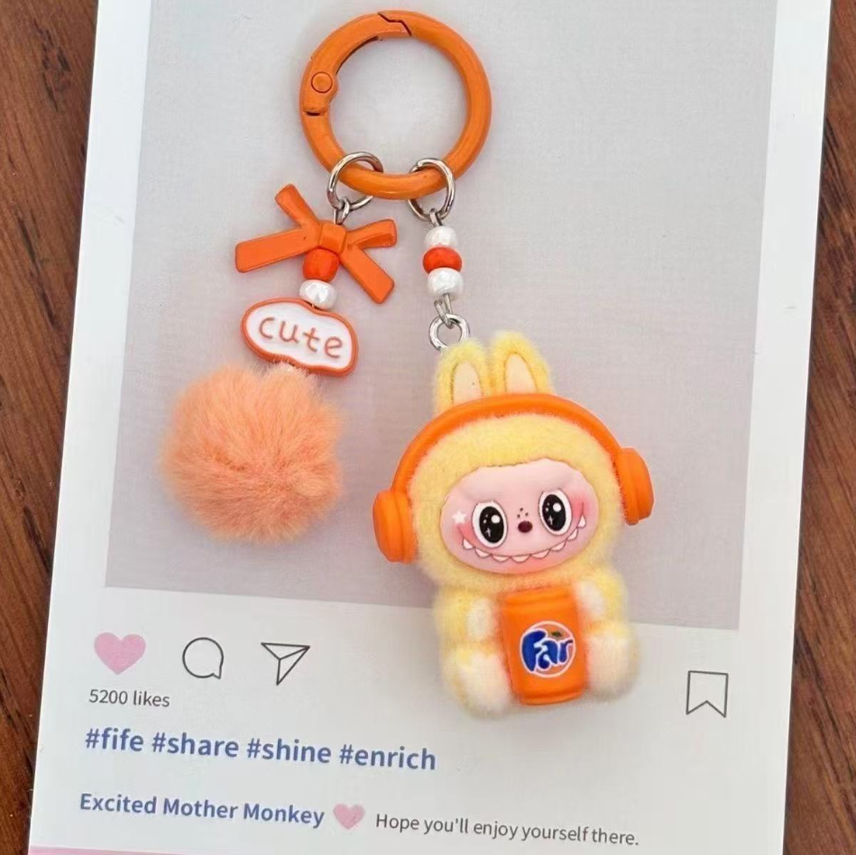 Flocked  pendant keychain cute doll sitting posture cute bag couple car keychain pendant