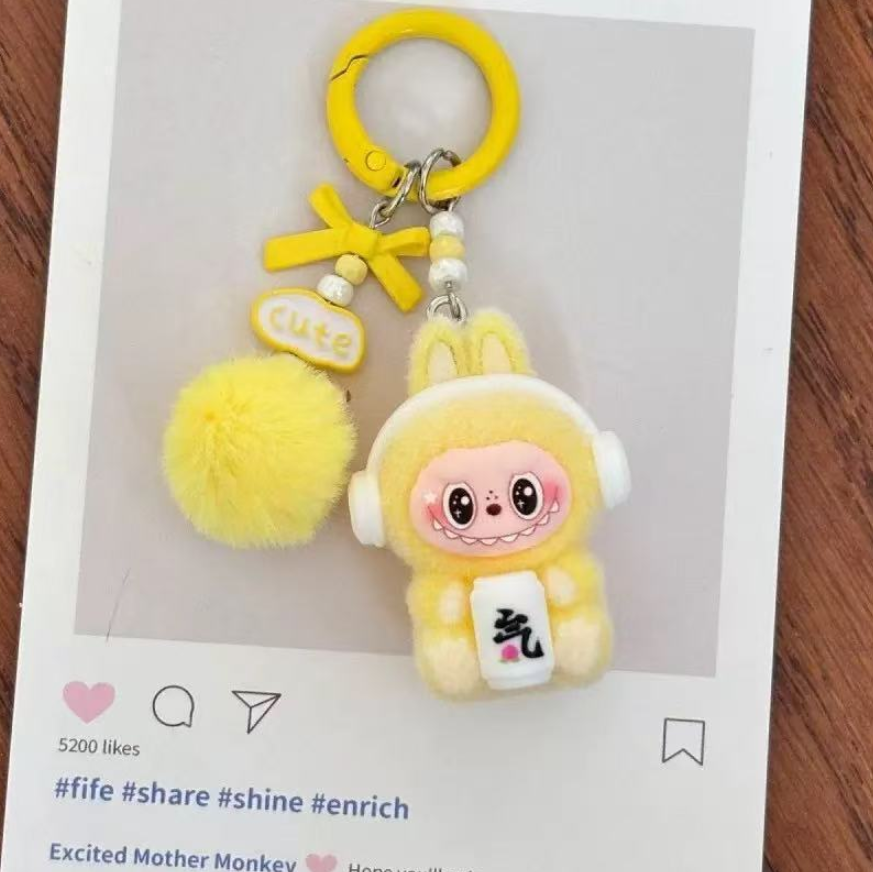 Flocked  pendant keychain cute doll sitting posture cute bag couple car keychain pendant