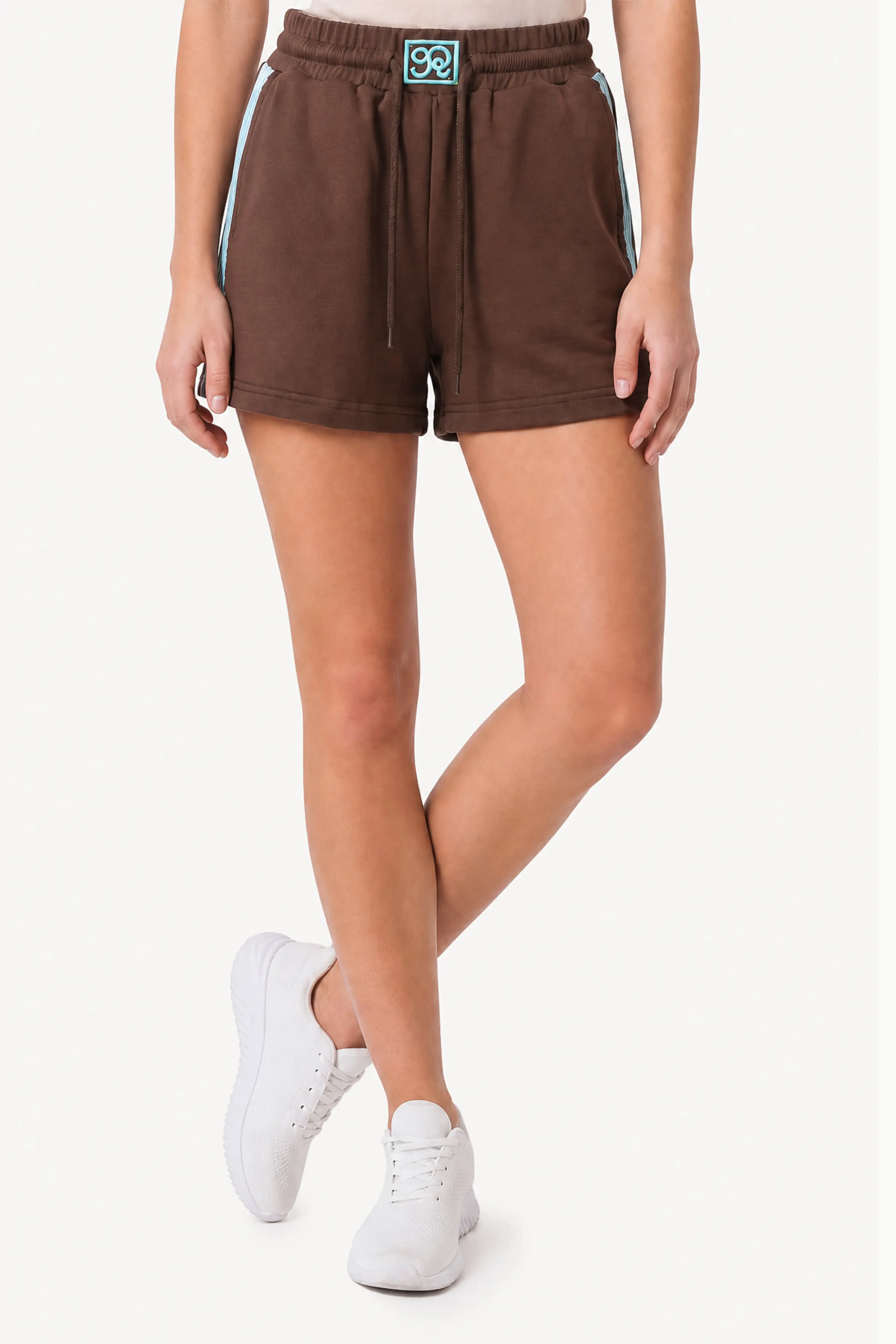 Side view of brown lace trim cotton sweat shorts with feminine sporty design
