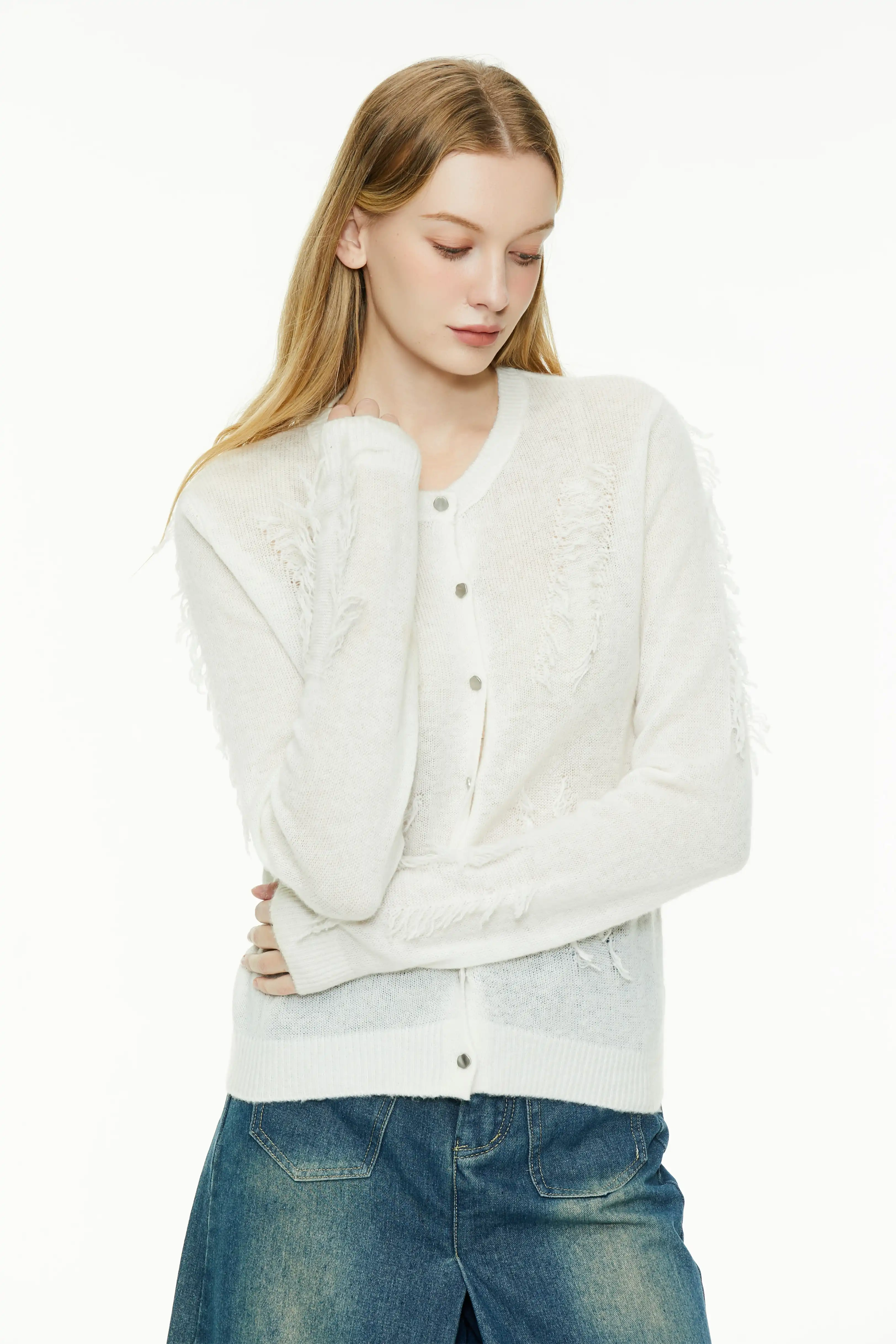 White cardigan with delicate textured knit panels and front button placket