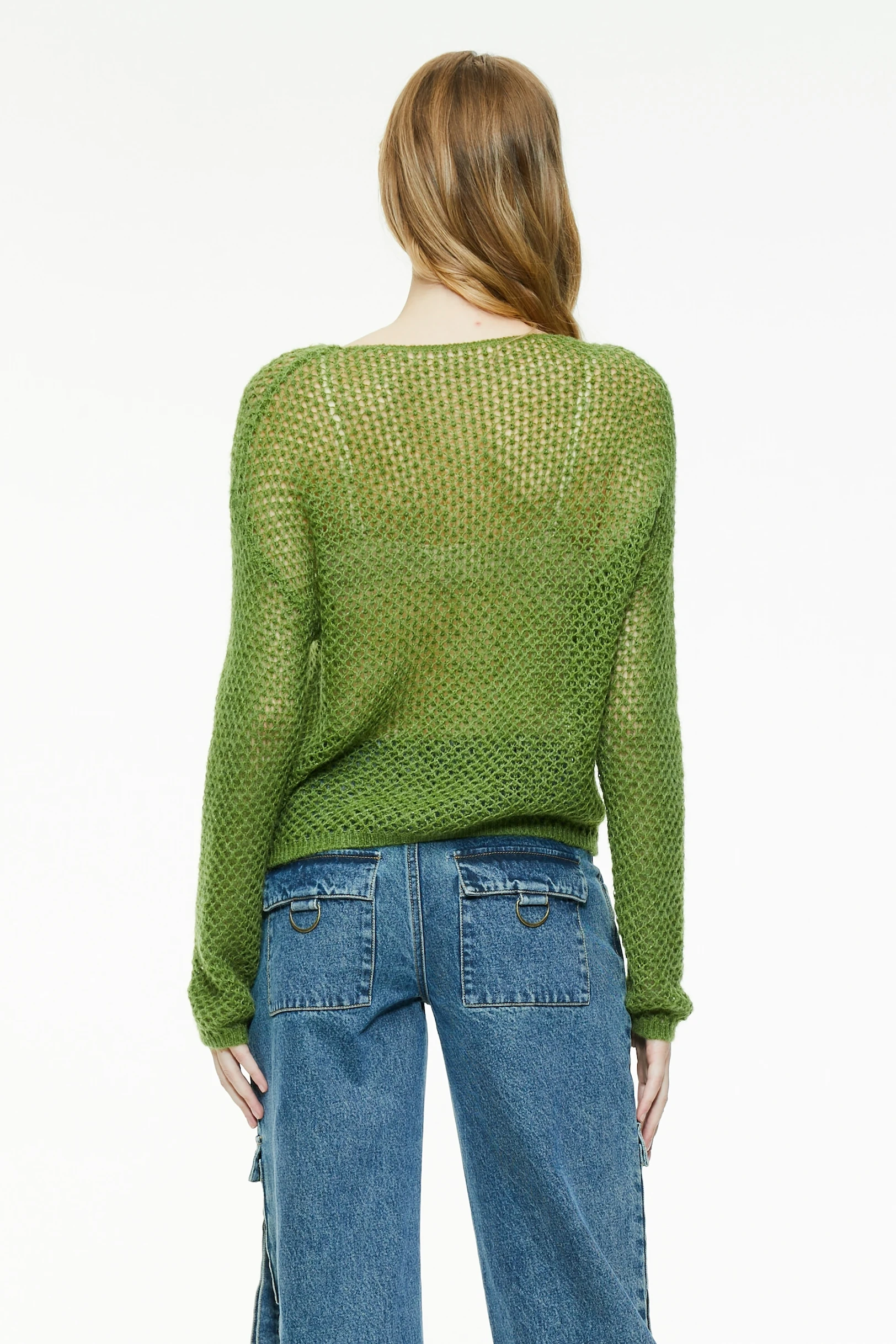 Back view of a green open knit sweater featuring a wide neckline