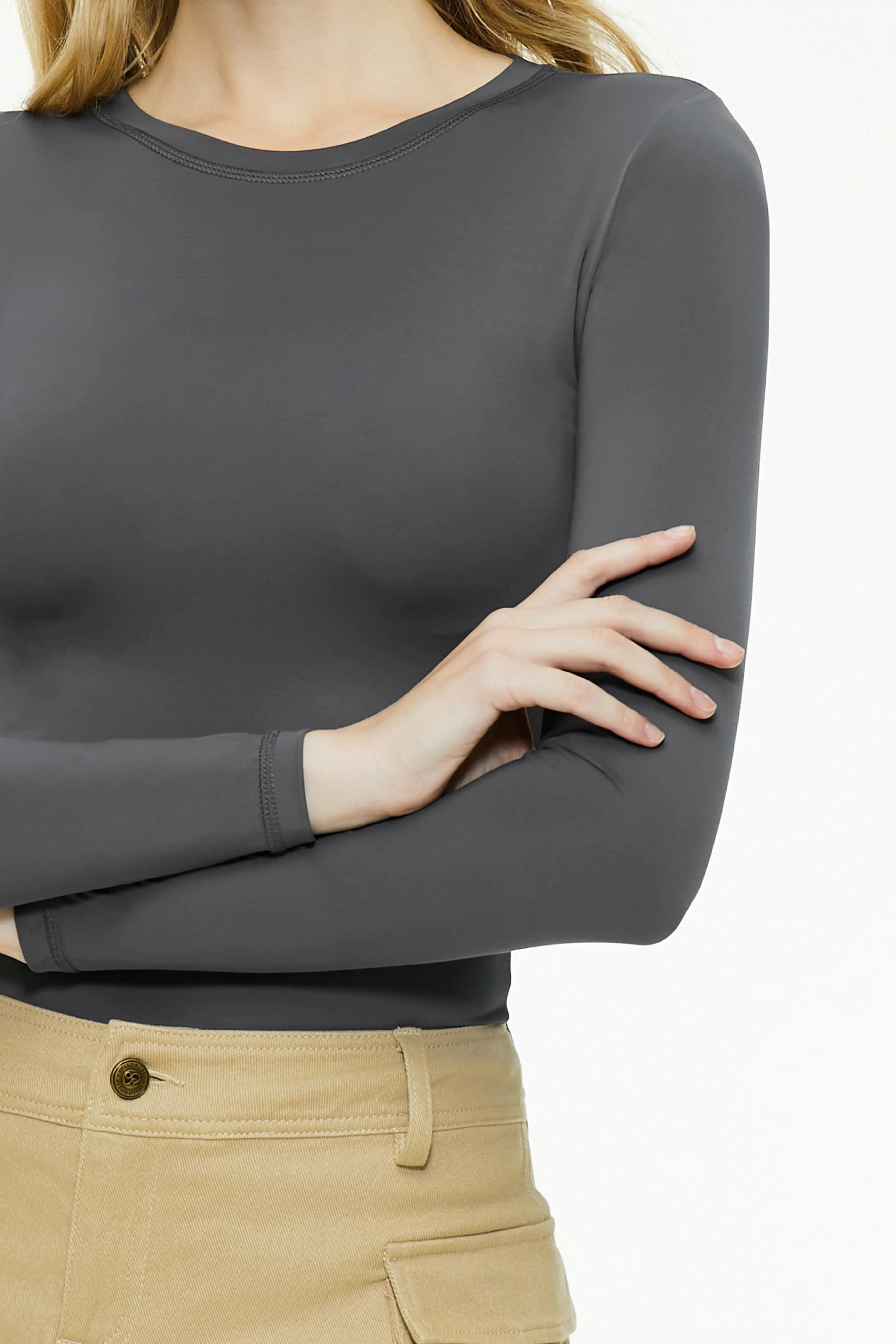Close-up detail of a dark gray long sleeve top