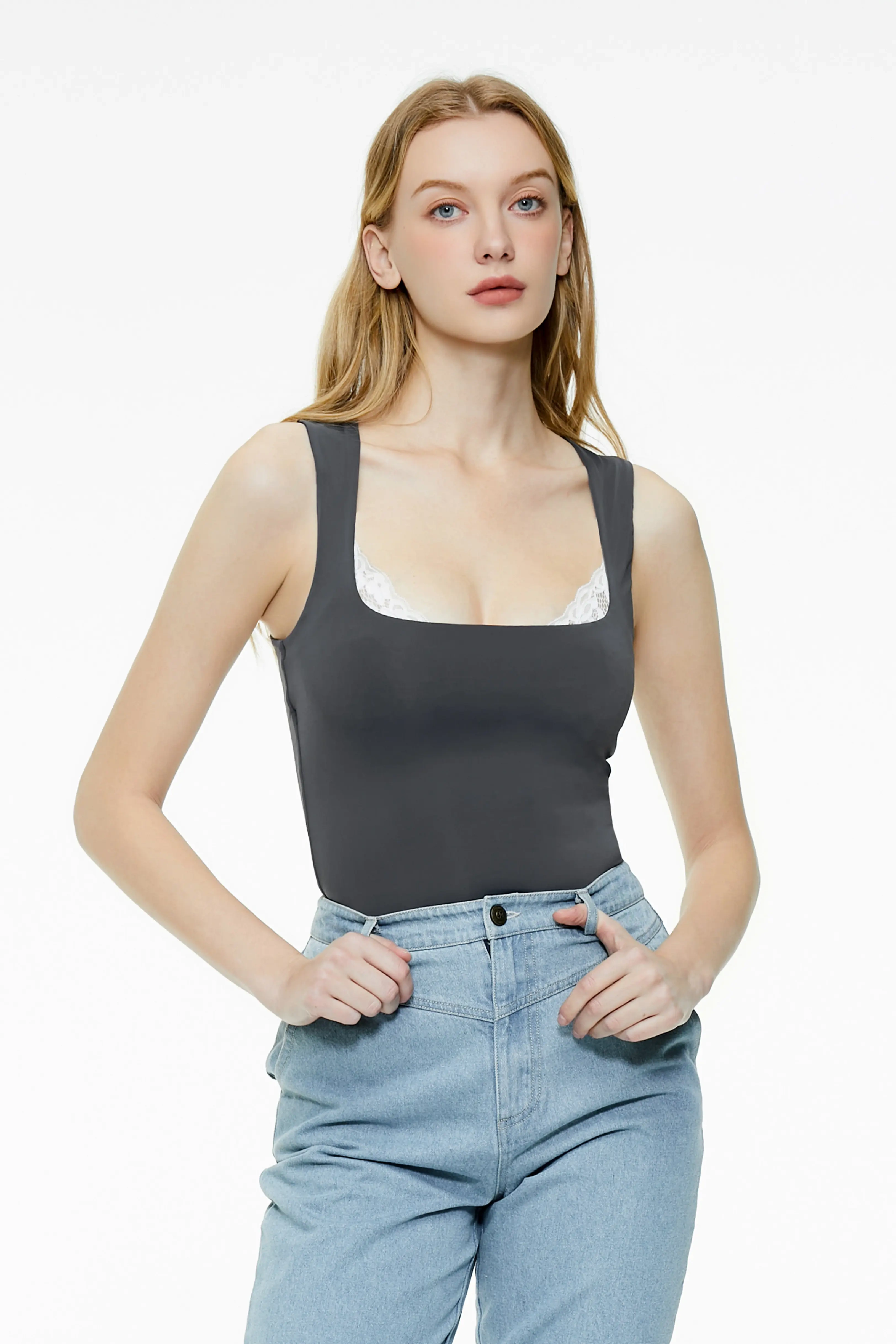 Gray-blue lace trim tank top with a square neckline paired with light blue jeans