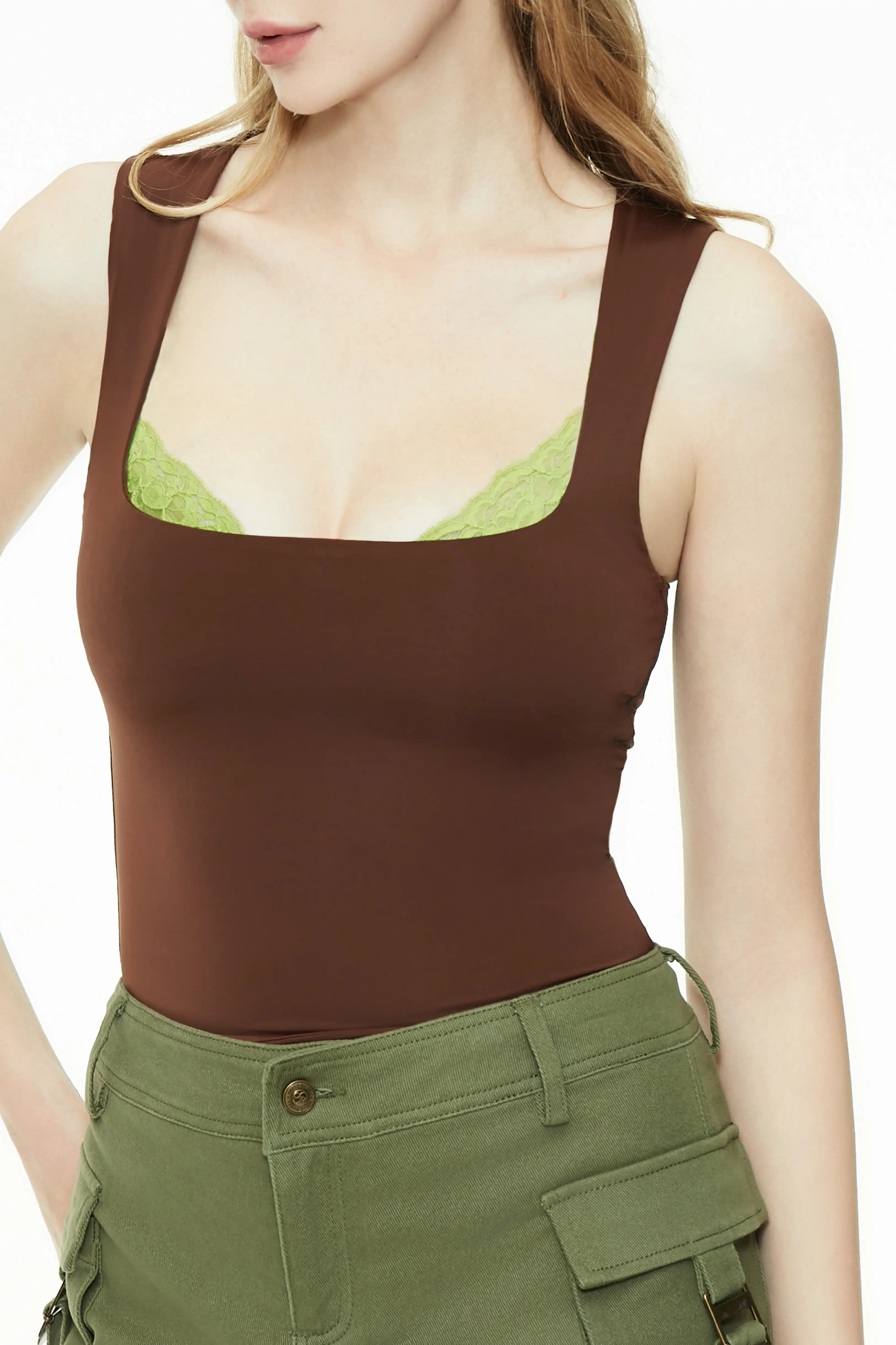 Close-up of a brown lace trim tank top in a cropped fit