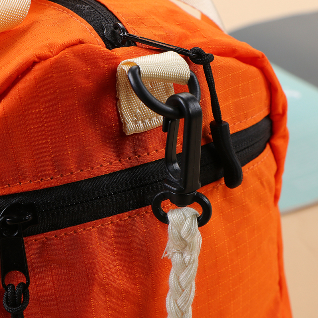 Travel Bag - Lightweight nylon gym bag  - Portable travel duffel  - Detachable shoulder strap bag  - Water-resistant sport tote  - Retro style barrel bag  - Casual crossbody duffel  - Small weekend travel bag