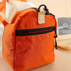 Travel Bag - Lightweight nylon gym bag  - Portable travel duffel  - Detachable shoulder strap bag  - Water-resistant sport tote  - Retro style barrel bag  - Casual crossbody duffel  - Small weekend travel bag