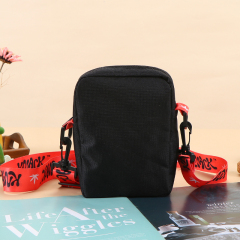 Travel Bag - Lightweight nylon gym bag  - Portable travel duffel  - Detachable shoulder strap bag  - Water-resistant sport tote  - Retro style barrel bag  - Casual crossbody duffel  - Small weekend travel bag