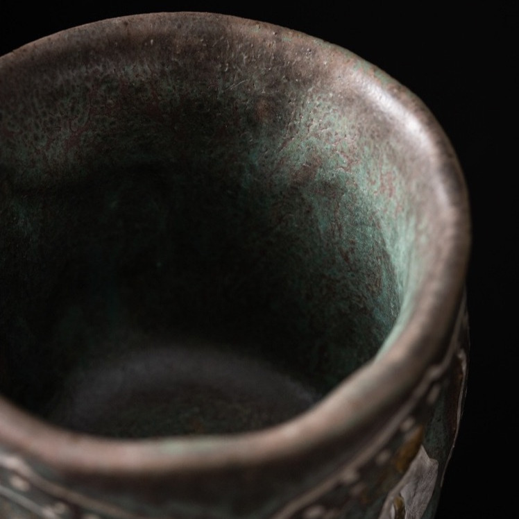 Macro detail of Eartivo Rock-Mineral clay texture, designed to develop a rich, lustrous patina and deepen in character through weeks of tea rituals.
