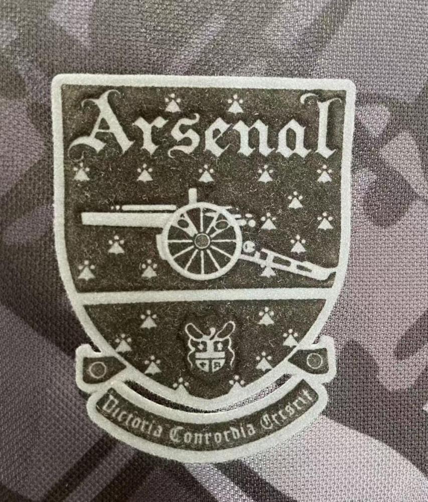 1990–1992 Arsenal Bruised Banana retro home shirt – special edition reissue featuring an all-black tonal pattern.
