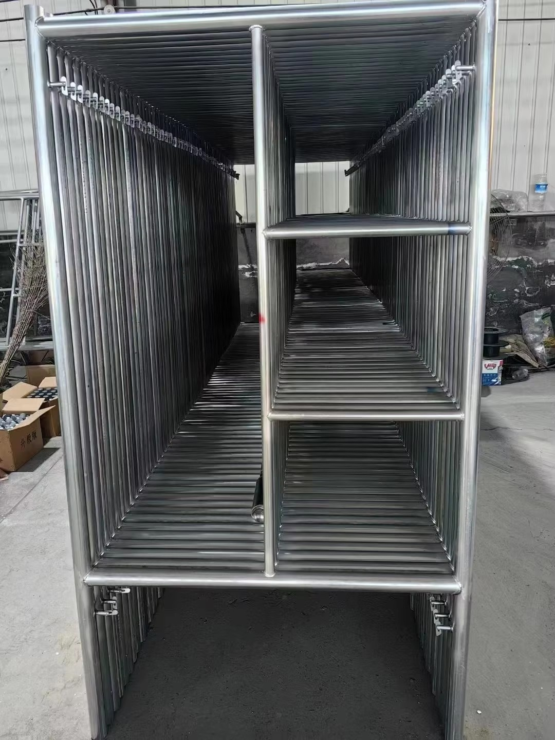 H-frame scaffolding for high-rise building construction