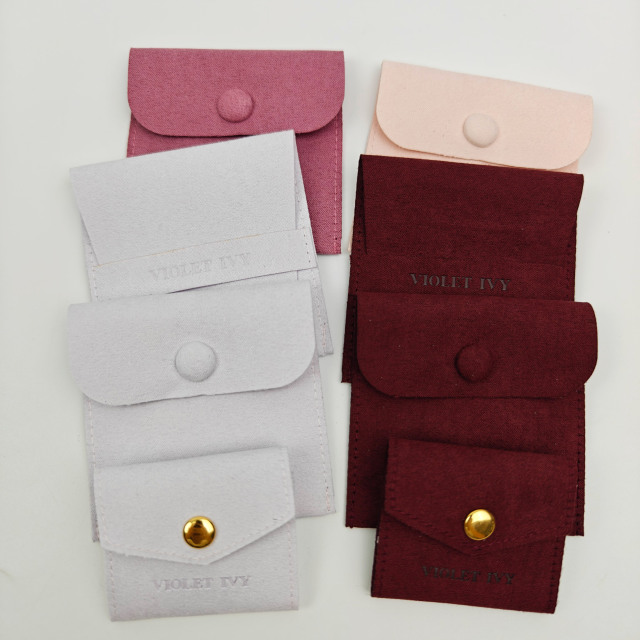 Custom Logo Fashionable Style Jewelry Packaging Pouch Luxury Modern Embossed Logo Faux Suede Pouch Storage Bag