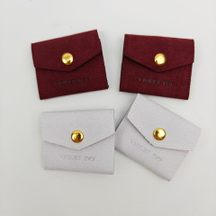 Custom Logo Fashionable Style Jewelry Packaging Pouch Luxury Modern Embossed Logo Faux Suede Pouch Storage Bag