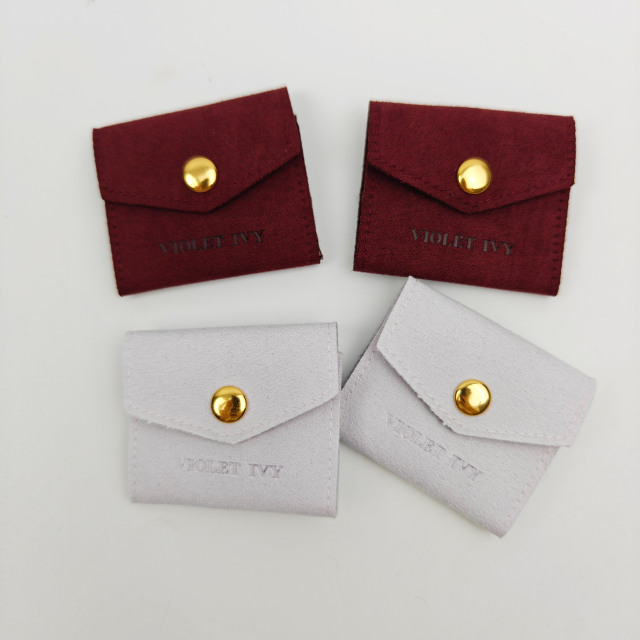 Custom Logo Fashionable Style Jewelry Packaging Pouch Luxury Modern Embossed Logo Faux Suede Pouch Storage Bag