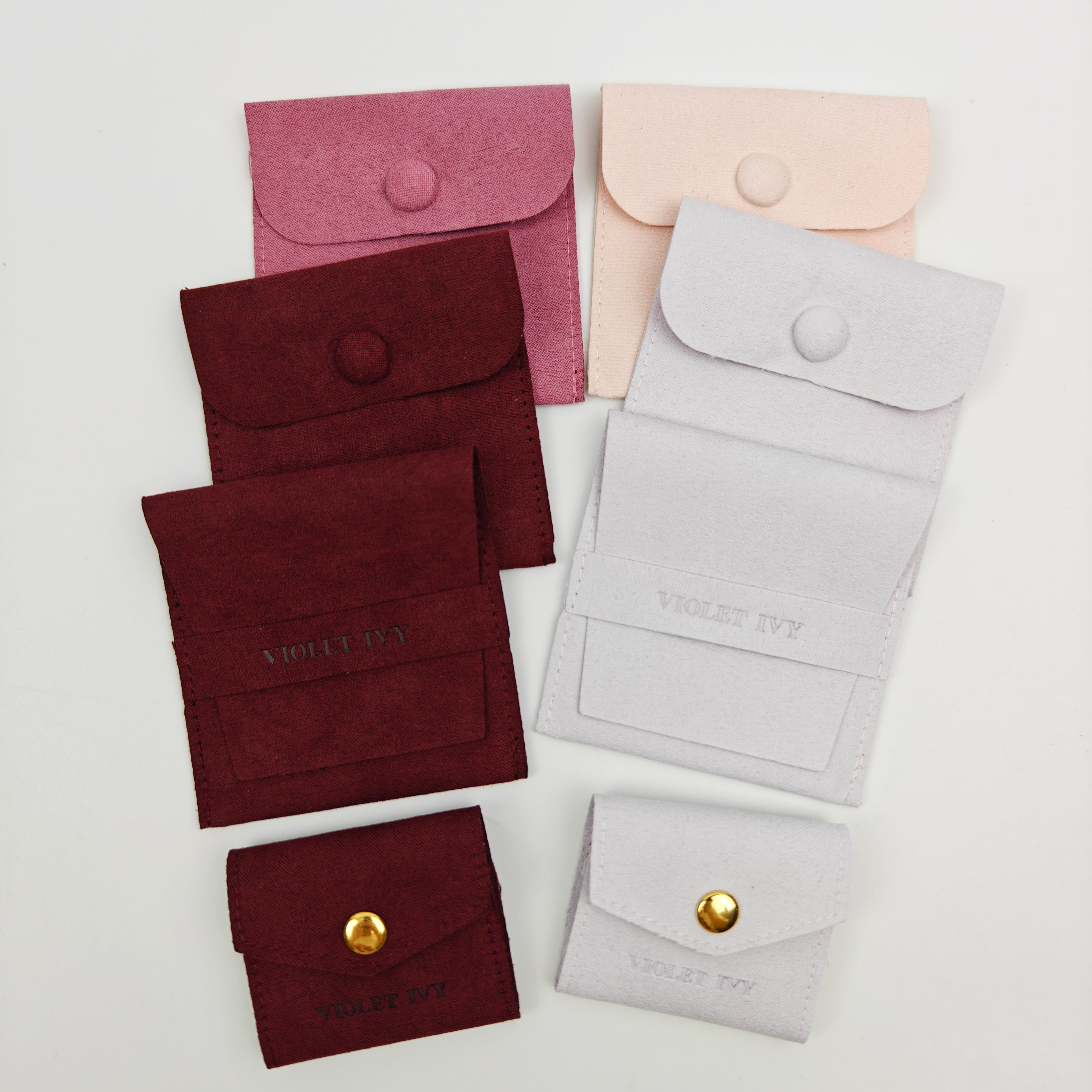 Custom Logo Fashionable Style Jewelry Packaging Pouch Luxury Modern Embossed Logo Faux Suede Pouch Storage Bag