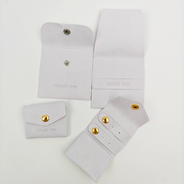 Custom Logo Fashionable Style Jewelry Packaging Pouch Luxury Modern Embossed Logo Faux Suede Pouch Storage Bag
