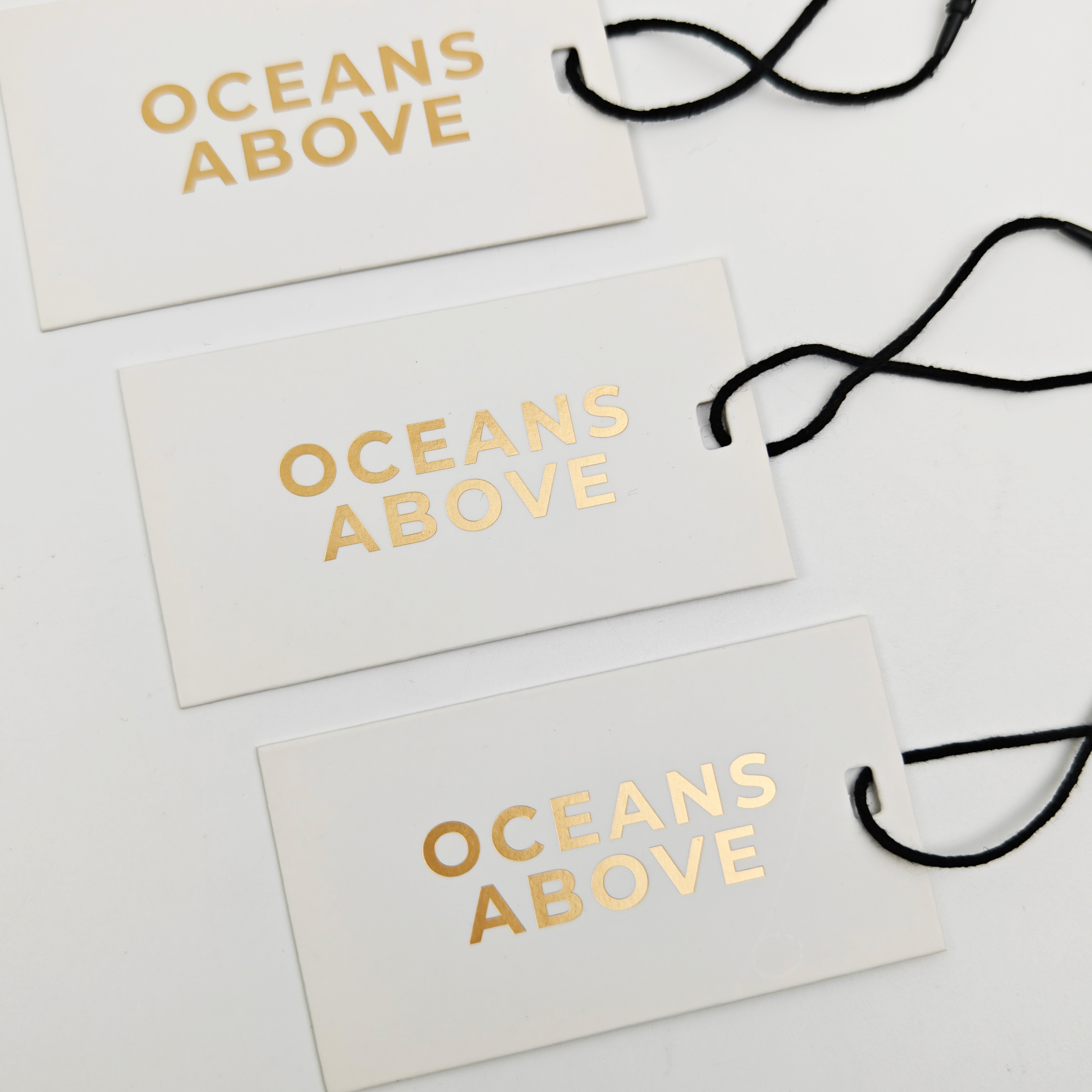 Wholesale Custom Thick Paper Hang Tags Eco-Friendly Luxury Garment Tag with Gold Logo