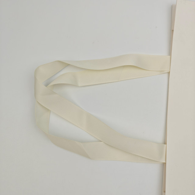 Custom White Kraft Gift Bags with Black Foil Logo & Ribbon Handles