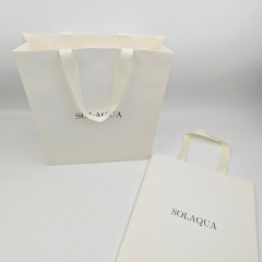 Custom White Kraft Gift Bags with Black Foil Logo & Ribbon Handles