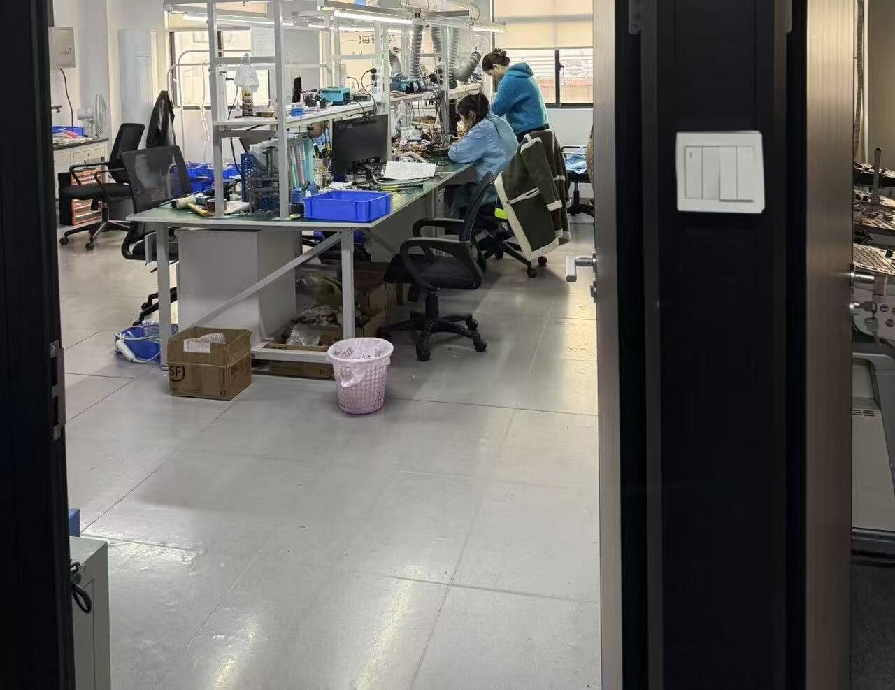 Ultrasound probe repair bench at the Fix Medical workshop in Zhengzhou