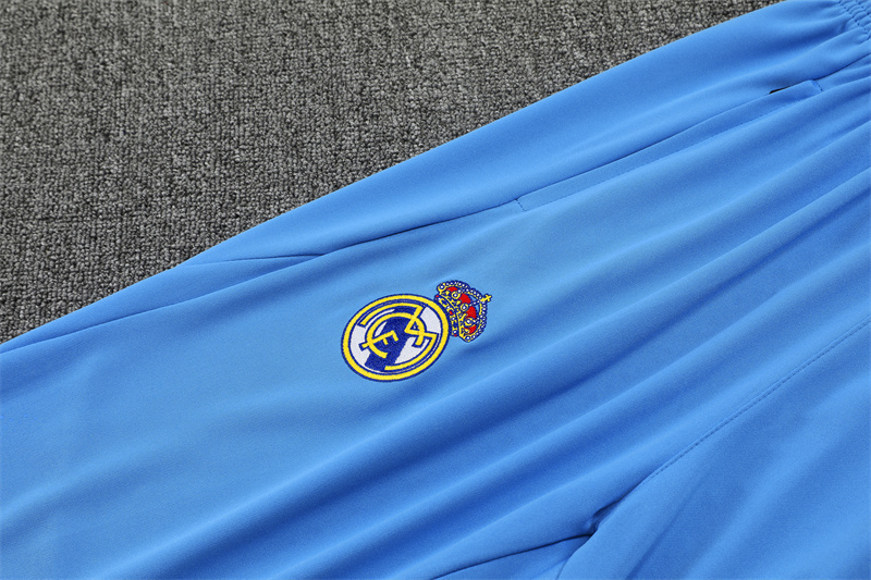Real Madrid white and light blue Training Kit 25/26