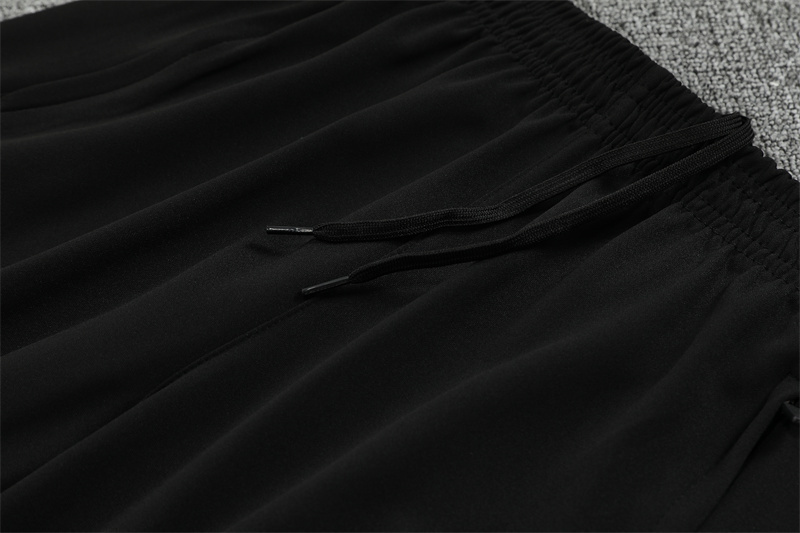 Real Madrid Black and Orange Training Kit 25/26
