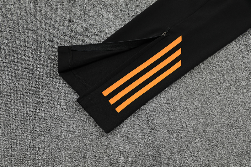 Real Madrid Black and Orange Training Kit 25/26