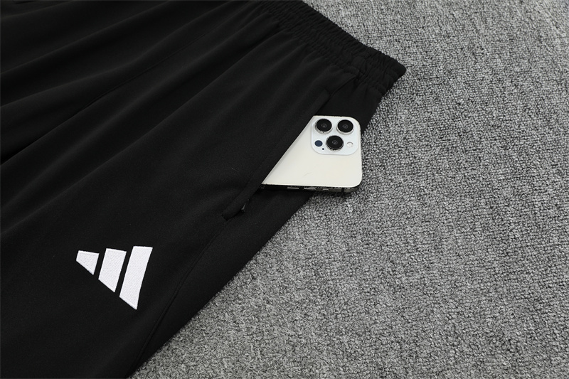 Real Madrid Black and Orange Training Kit 25/26
