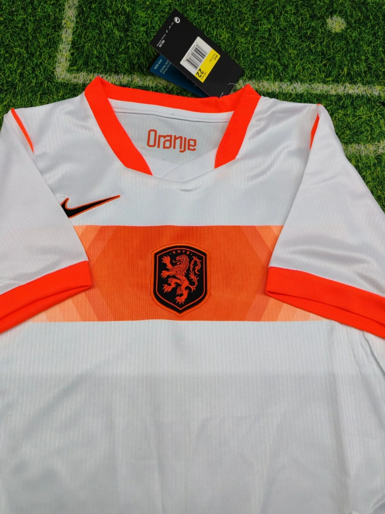 2026 World Cup Netherlands away kids wearing socks soccer jersey