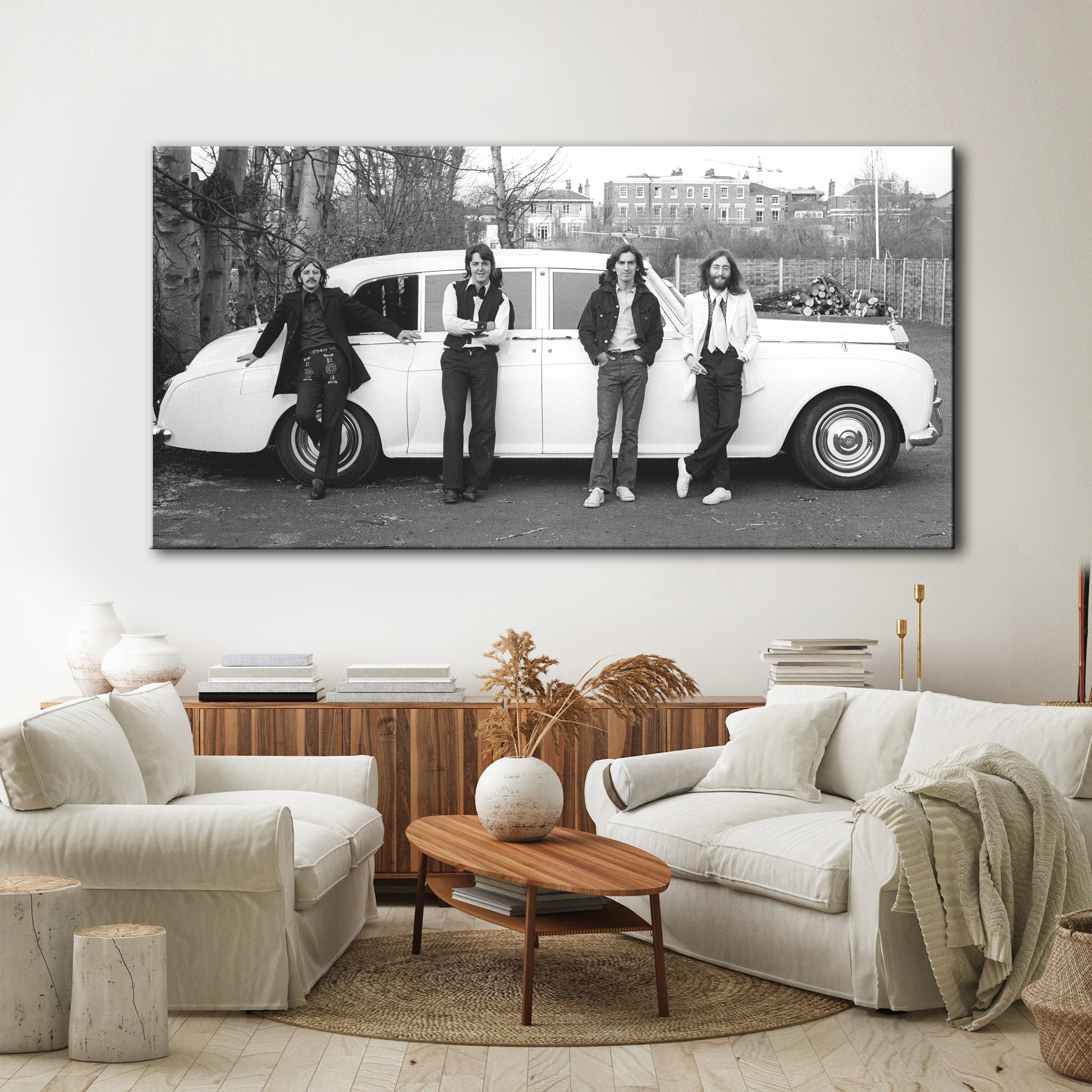 The Beatles in front of John Lennon's Rolls Royce Phantom. 1969 Canvas Art